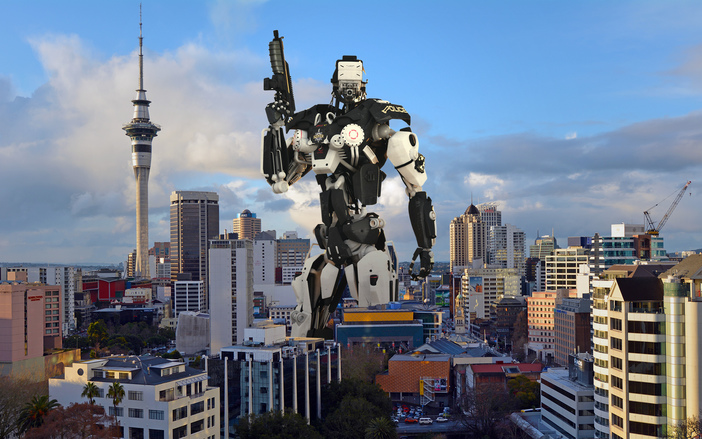 Robot standing over a city